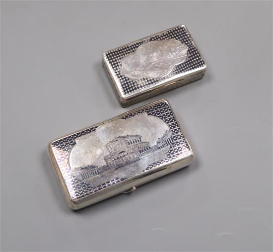 A 19th century Russian 84 zolotnik and niello cigarette case, 1873 and a similar earlier snuff box, 1858?, case 10.5cm.